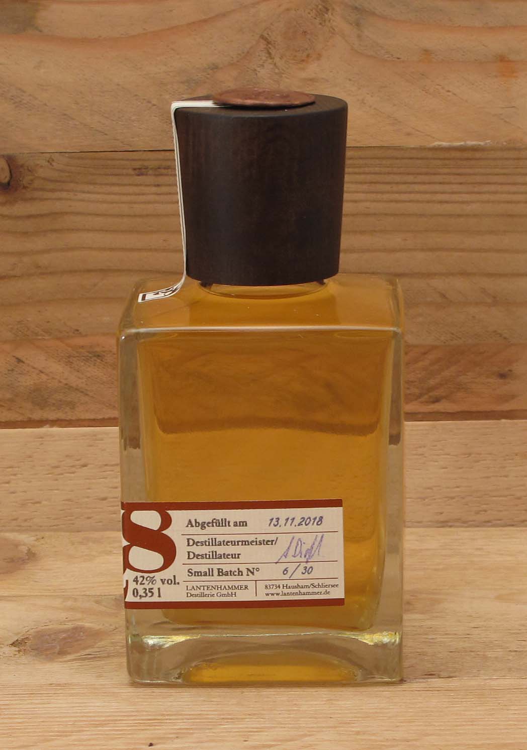 1928-Sauerkirschbrand-im-Kirschholzfass-Seite