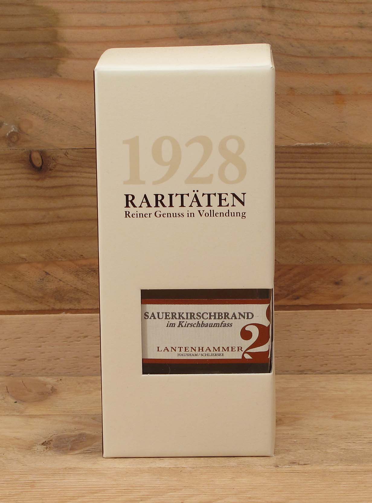 1928-Sauerkirschbrand-im-Kirschholzfass-Karton