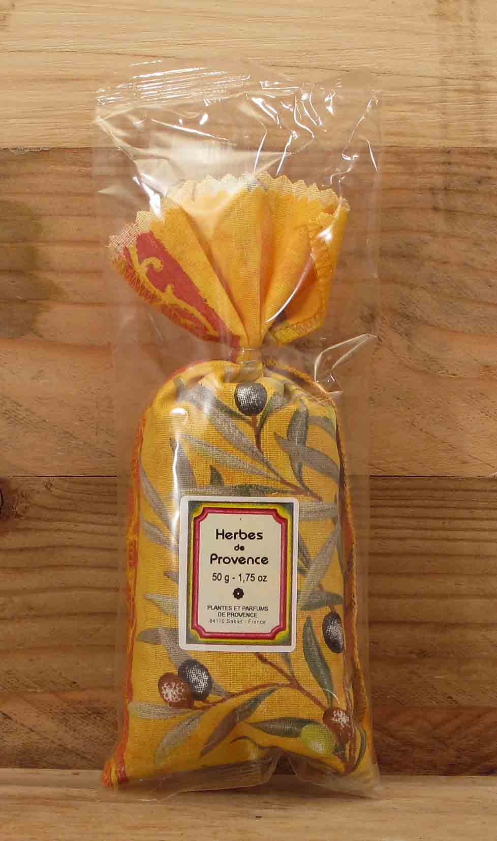 Kräuter der Provence im gelben Stoff